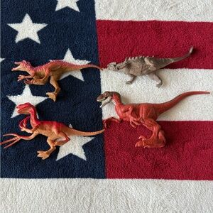 Set of 4 Dinosaurs Figurines in Red and Brown